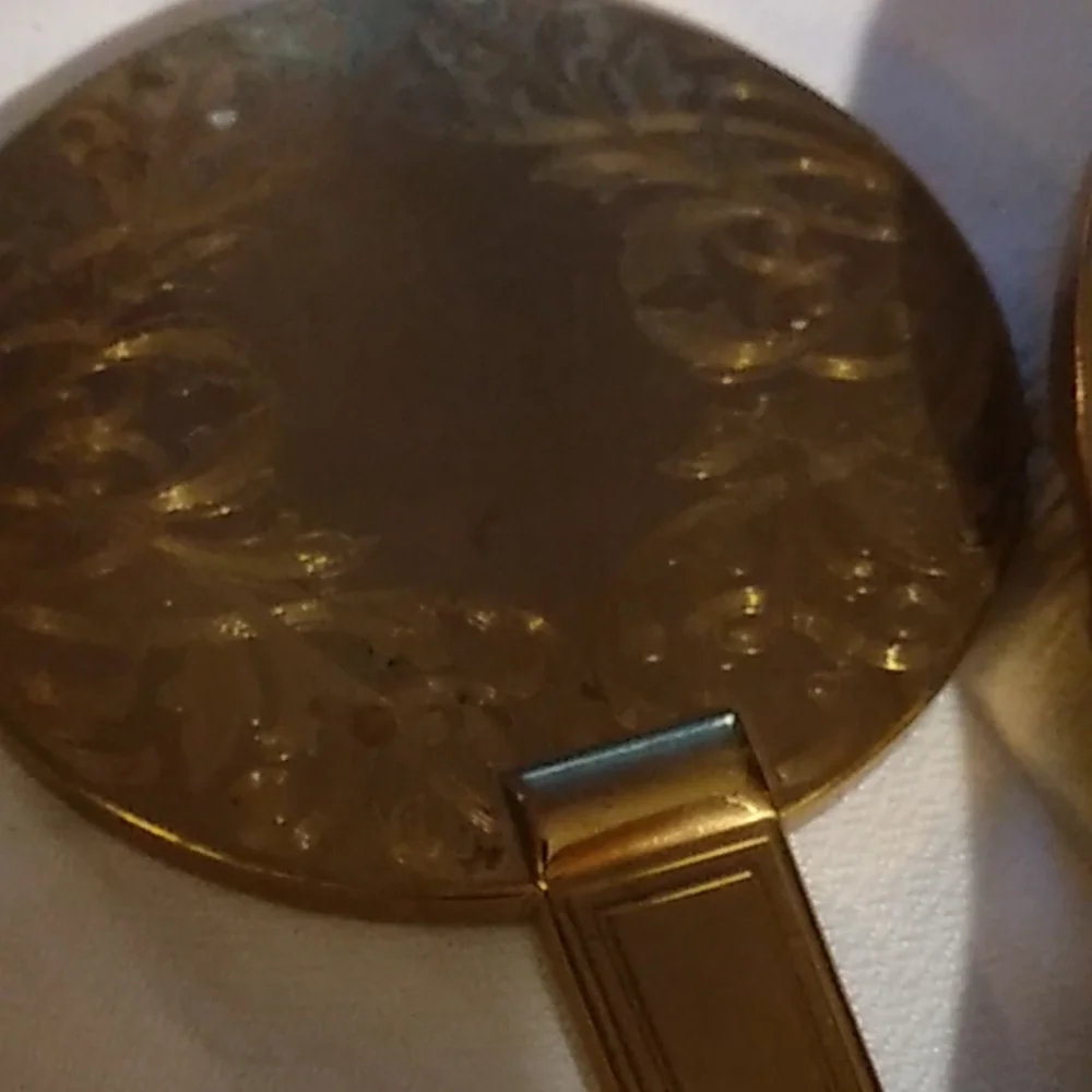 Vintage vanity mirror and hairbrush